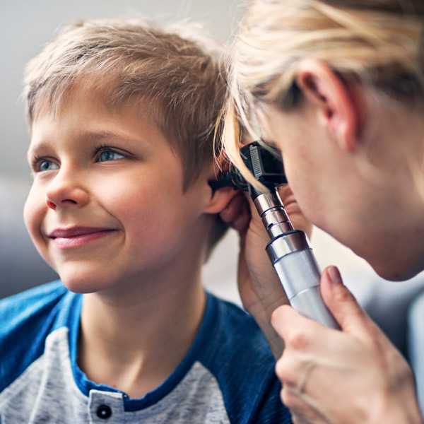 Doctor Examining Child's Ears