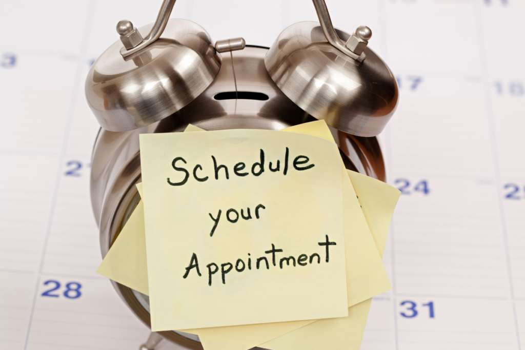 Image of an alarm with a note reminding you to schedule an appointment for an annual hearing evaluation
